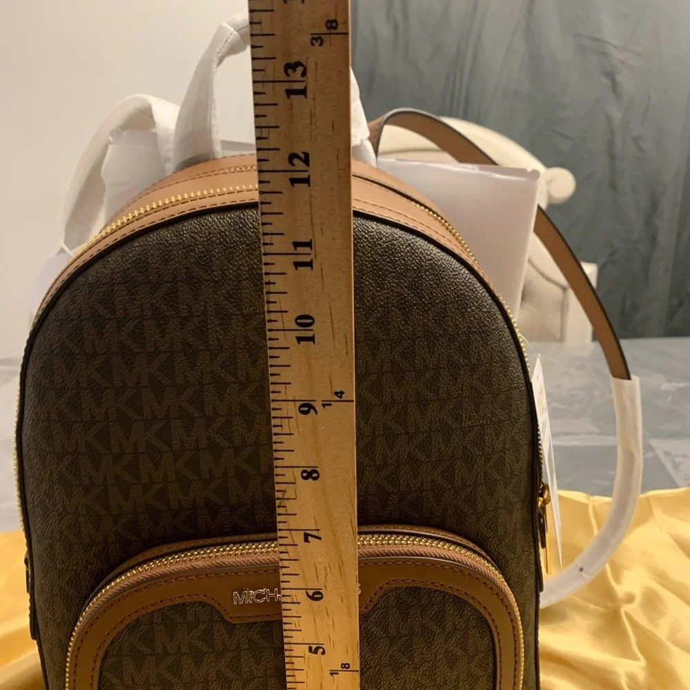 Michael Kors Jaycee Medium Brown Backpack with Monogram Pattern and Gold Zippers
